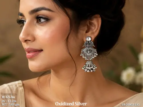 Stone-Studded Peacock Jhumka Earrings in Oxidised Finish