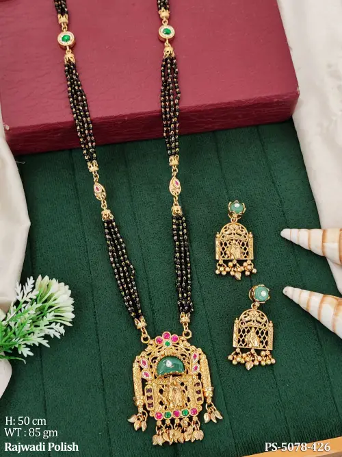 Designer Traditional Mangalsutra Set with Matching Ethnic Earrings and Charms