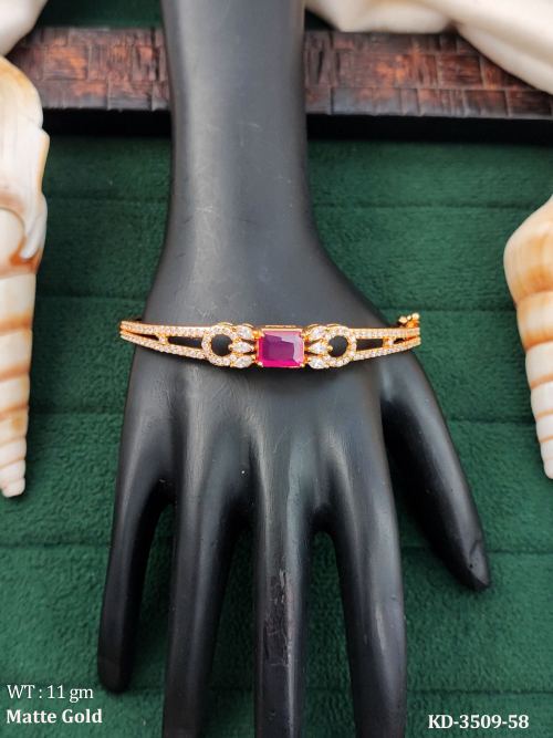 Elegant Matte Gold Bracelet with Red Crystal Center