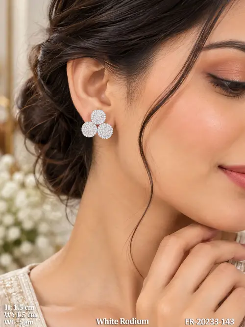 AD Stud Earrings in White Finish