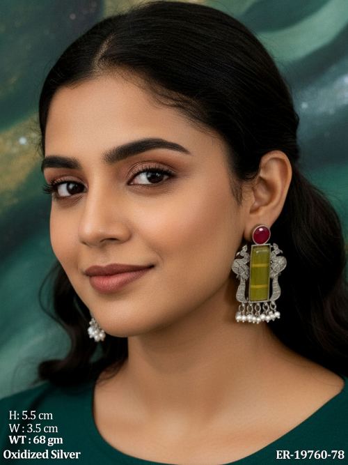 Oxidised Finish Stone-Studded Earrings with Peacock Design