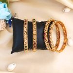 Antique Floral Design Gold-Plated Matte Finish Bangles with Ruby and Emerald Stones (Set of 4)
