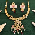 Temple Jewellery Rajwadi Polish Short Necklace Set with Fancy Design, Red & Green Stones, and Jhumka Earrings.