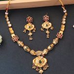 Ethnic Gold Floral Necklace Set with Red and Green Enamel Accents